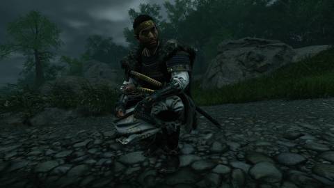 Jin crouching in Ghost of Tsushima