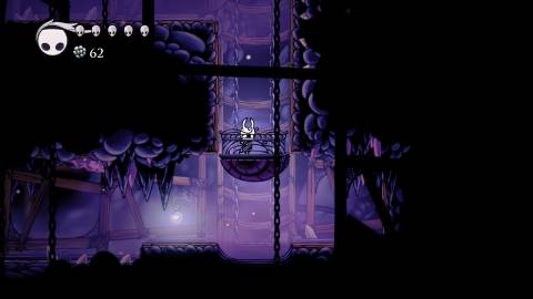 Riding an elevator in Hollow Knight