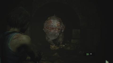 Shooting a sewer mutant in Resident Evil 3 (2020)