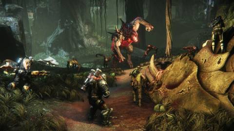 The four hunters team up to take down a monster - Evolve