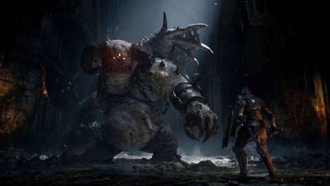 The playable character facing off against a giant early boss - Demon's Souls