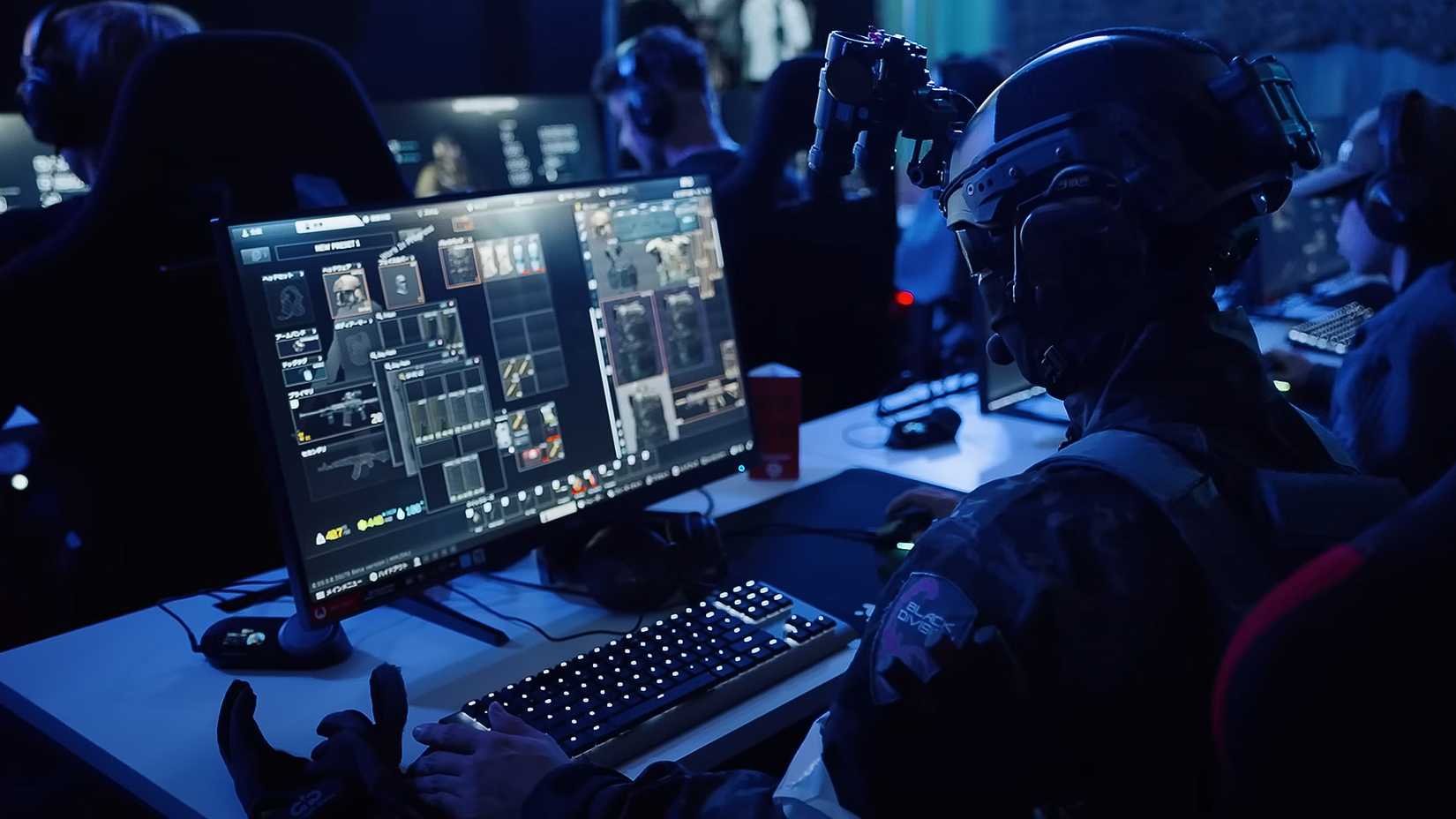 Tokyo Games Show 2025 person in full body armor plays Escape from Tarkov