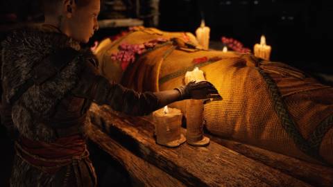 Atreus by his mom’s body in God of War (2018)