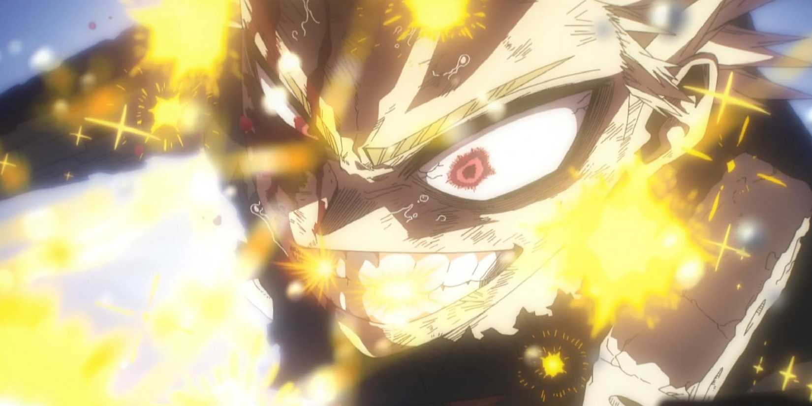 Katsuki Bakugo smiles while fighting with yellow energy around him.