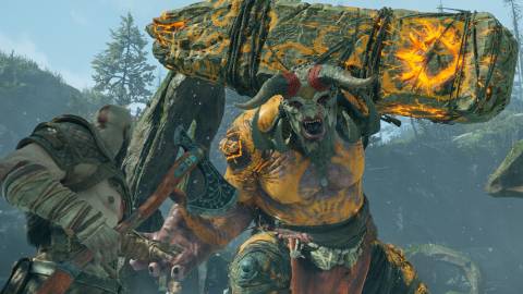 Fighting a boss in God of War (2018)