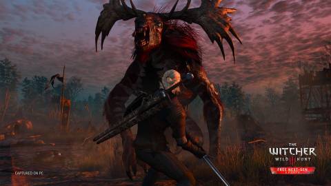 Geralt fighting a giant monster - The Witcher 3