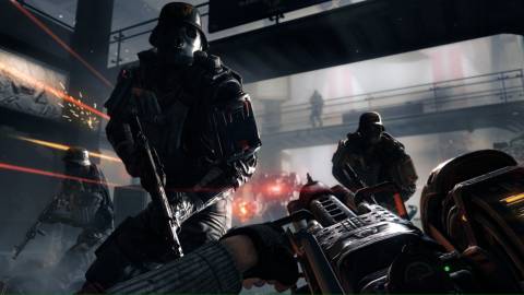 Shooting enemies with a Gatling gun in Wolfenstein The New Order