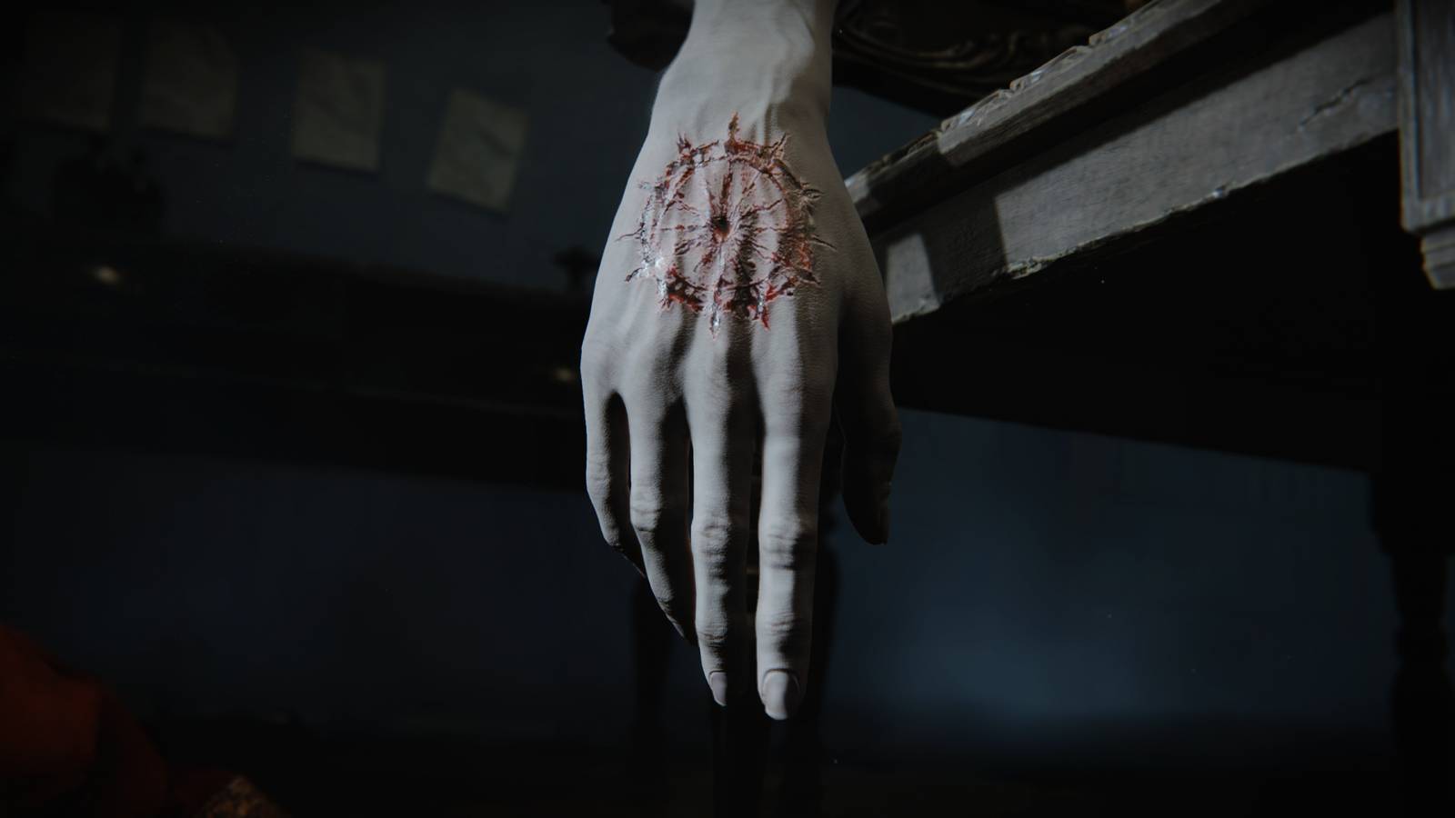 Shot of a marked hand in The Duskbloods Trailer