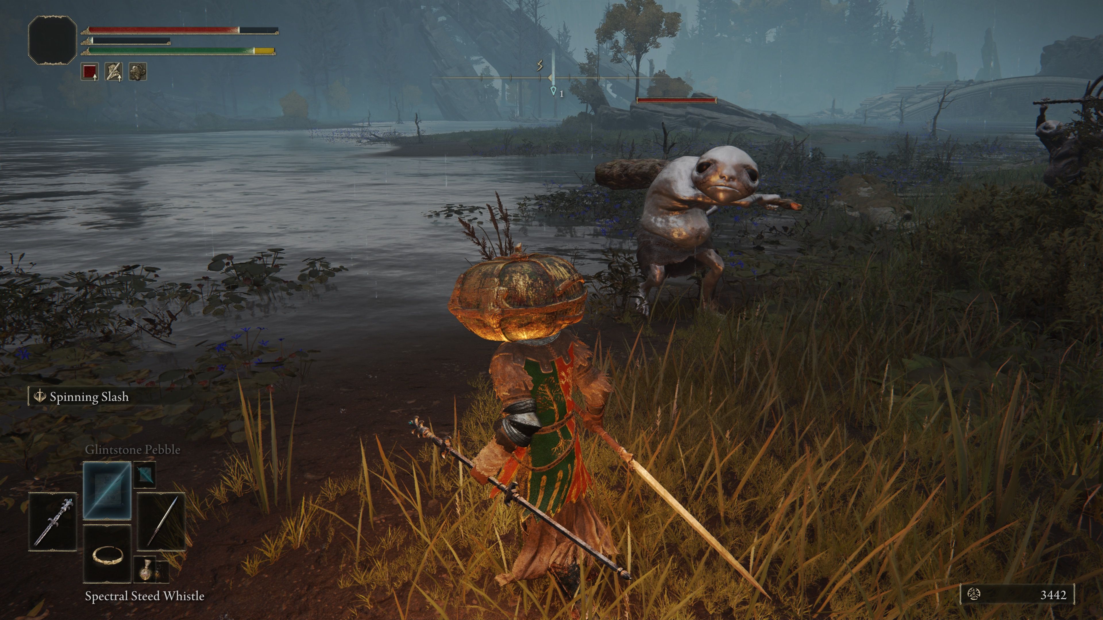 Fighting an enemy in Elden Ring (2022)