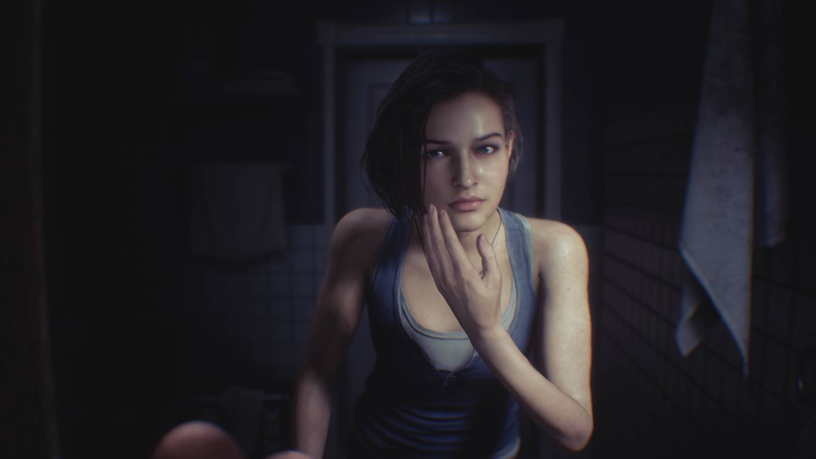 Jill looking in the mirror in Resident Evil 3 (2020)
