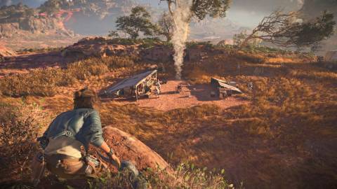 Overlooking an enemy camp in Star Wars Outlaws (2024)