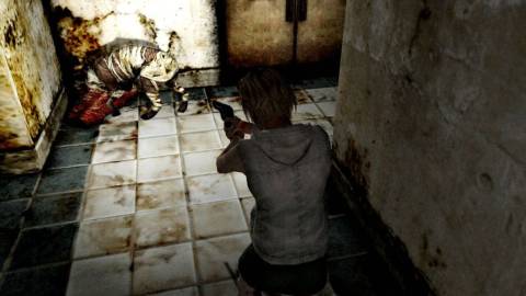 Shooting an enemy in Silent Hill 3 (2003)