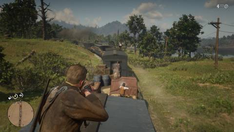 Shooting enemies on a train in Red Dead Redemption 2 (2018)