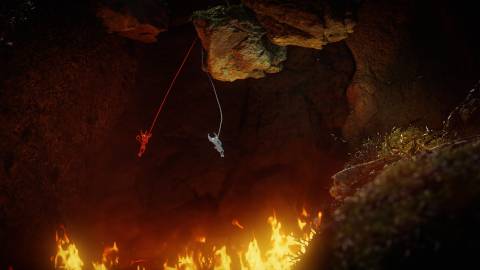 Swinging in a cave in Unravel Two