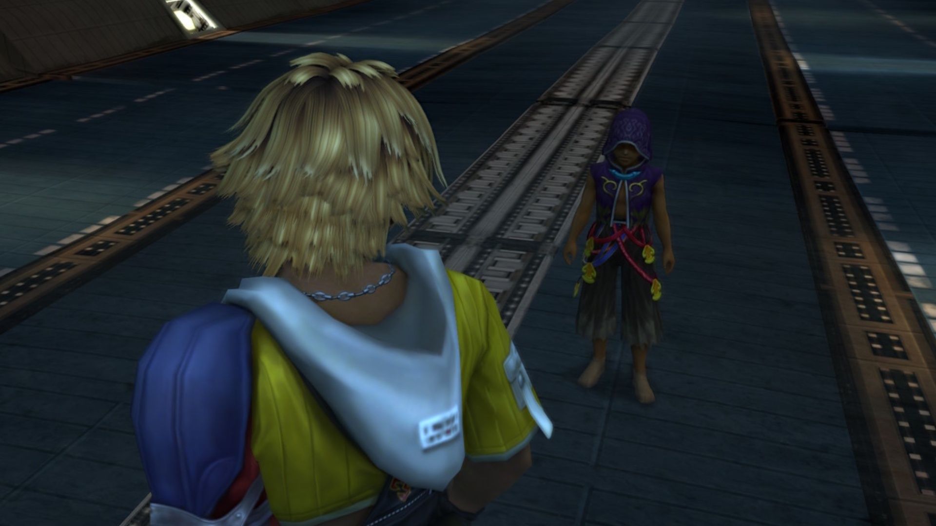 Tidus talking to a child in Final Fantasy 10 (2001)