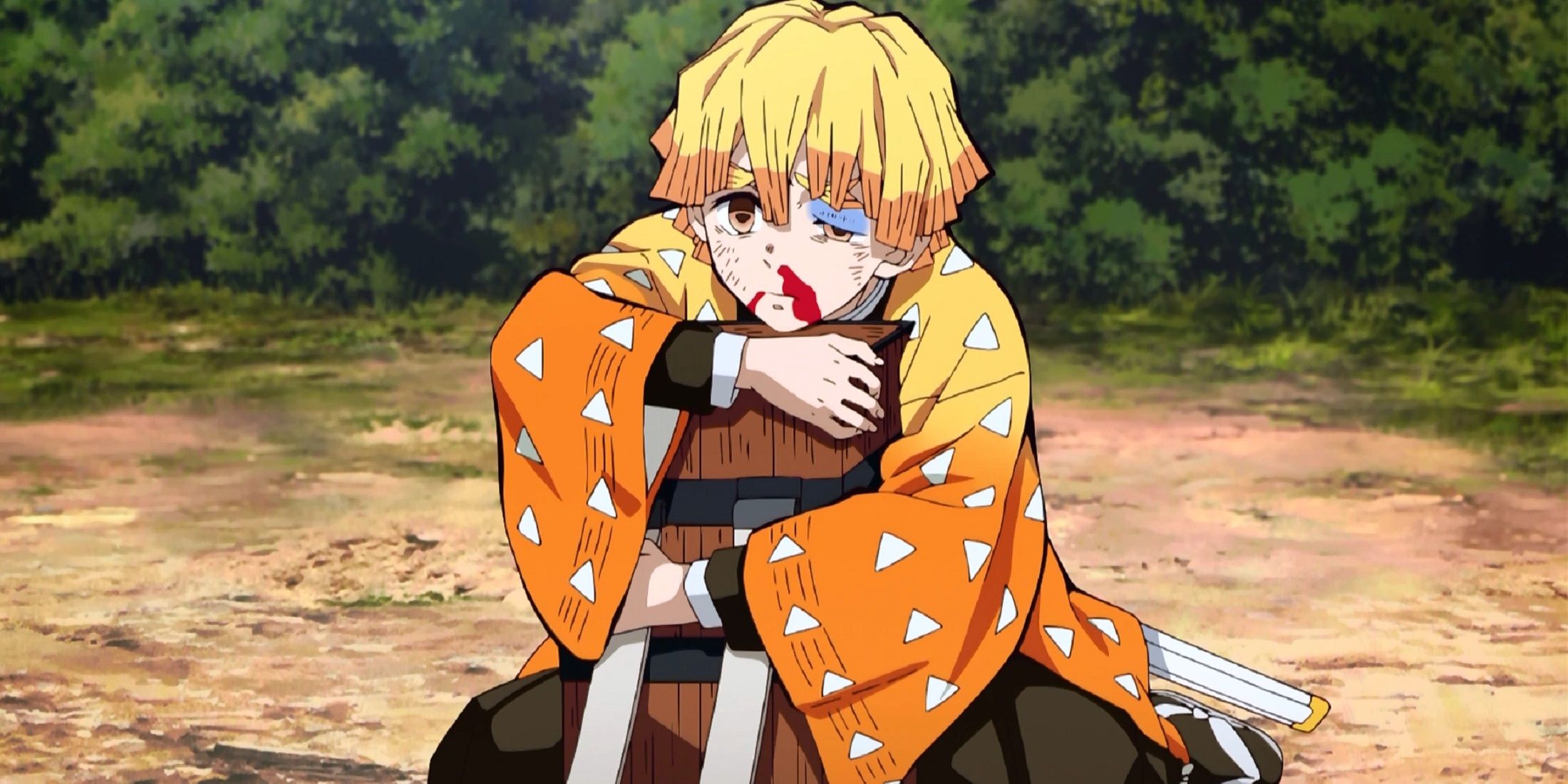 Zenitsu melindungi Nezuko dari Inosuke