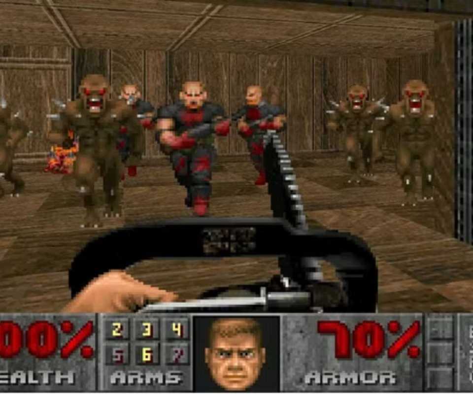 Screenshot gameplay Doom dengan gergaji mesin