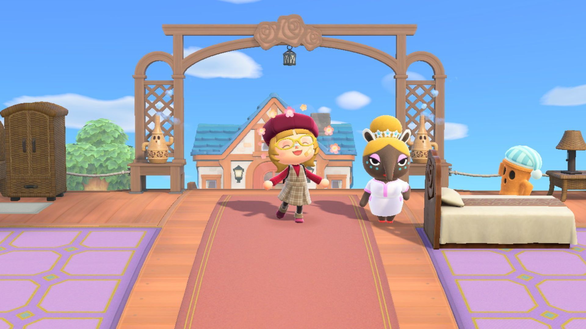 An Animal Crossing: New Horizons player celebrating next to Luna and Lloid at the start of a Slumber Island