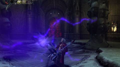 Attacking enemies with a guitar in Devil May Cry 3 (2005)