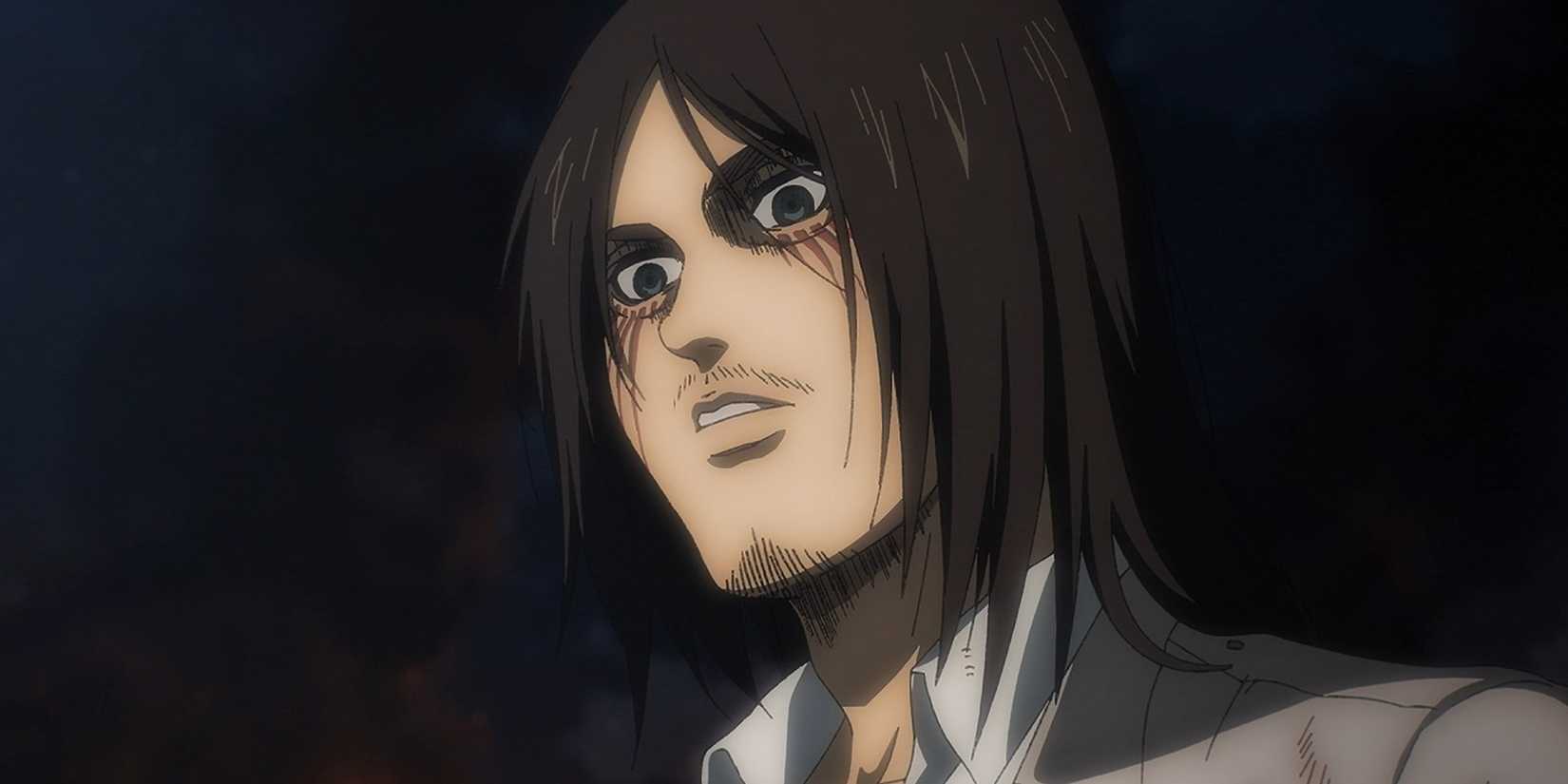 Eren Yeager menunduk dengan rambut panjang, salah satu karakter dari rekomendasi anime shonen.