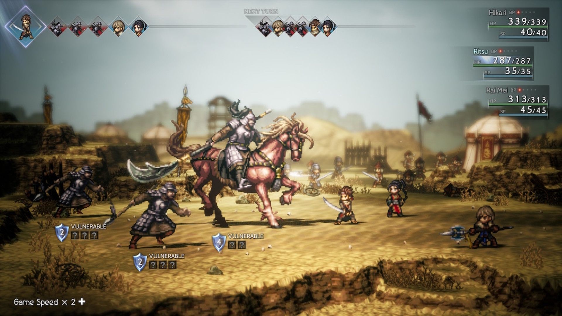 Fighting a battle on a battlefield in Octopath Traveler 2 (2023)