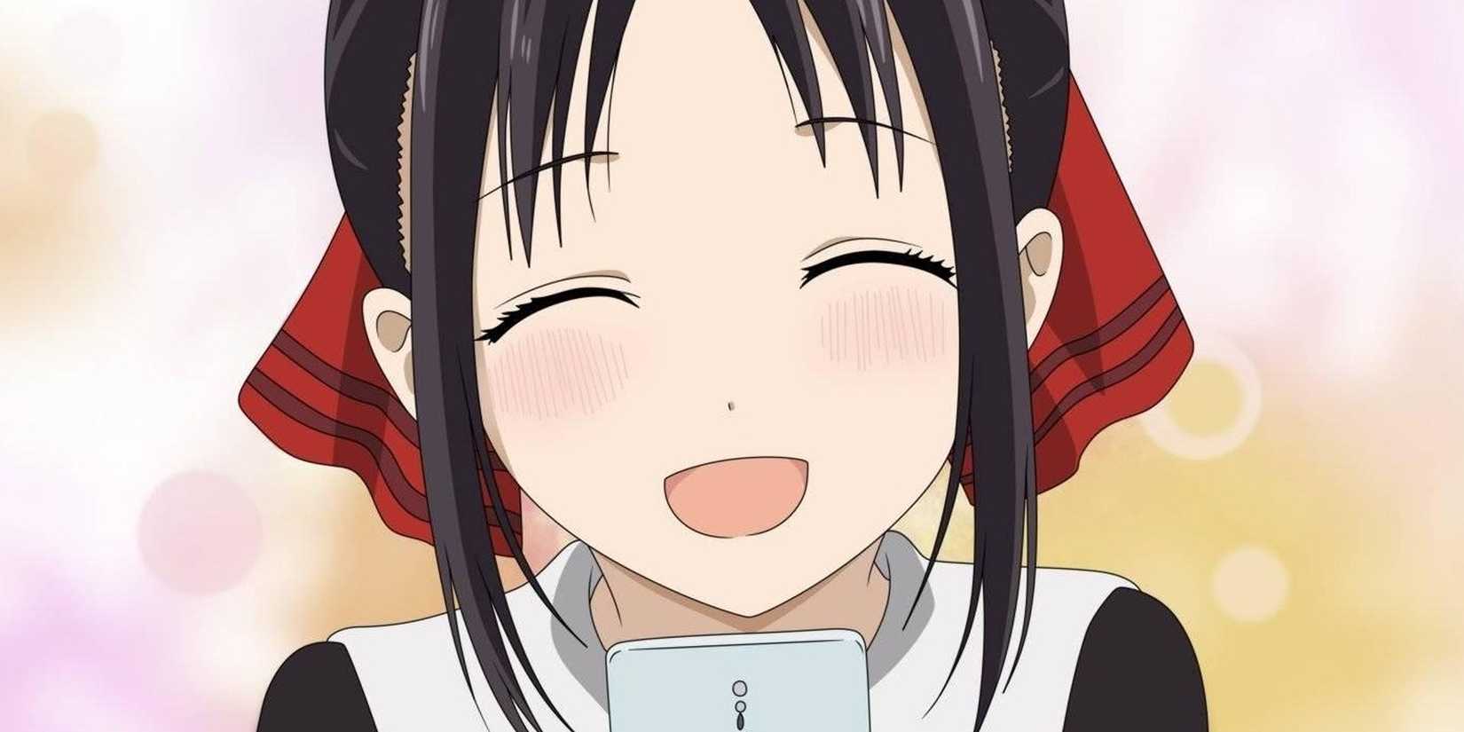 Kaguya Shinomiya is happy with a phone.