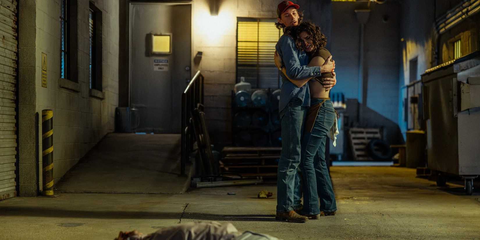 Cooper hugs Ariana in the alley behind the bar in Landman