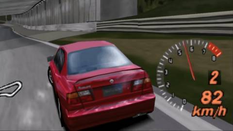 Racing a red car in Gran Turismo 2 (1999)