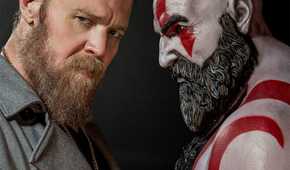 ryan-hurst-next-to-statue-of-kratos-god-of-war-amazon-tv-series