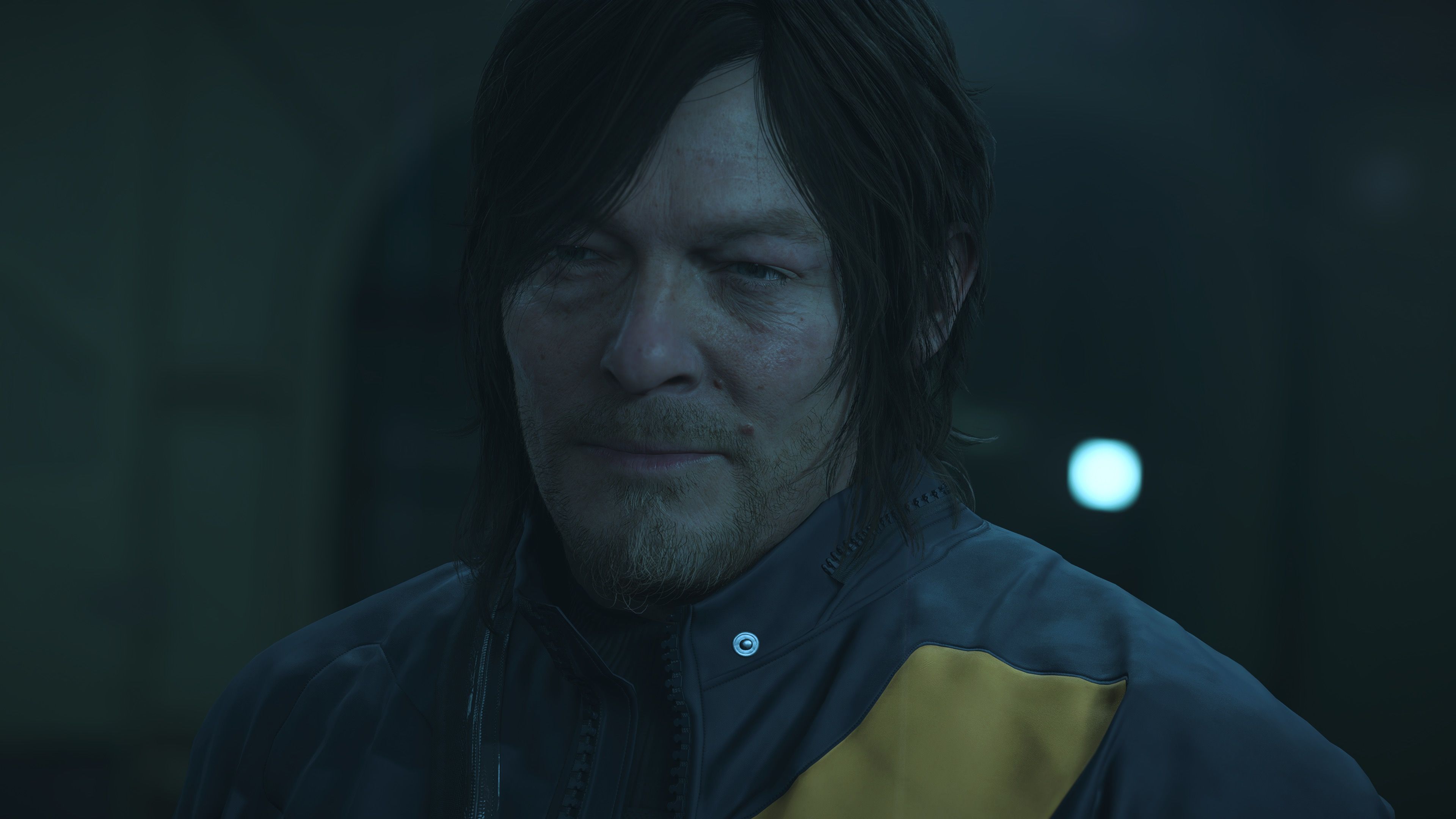 Sam in blue in Death Stranding 2 On the Beach (2025)