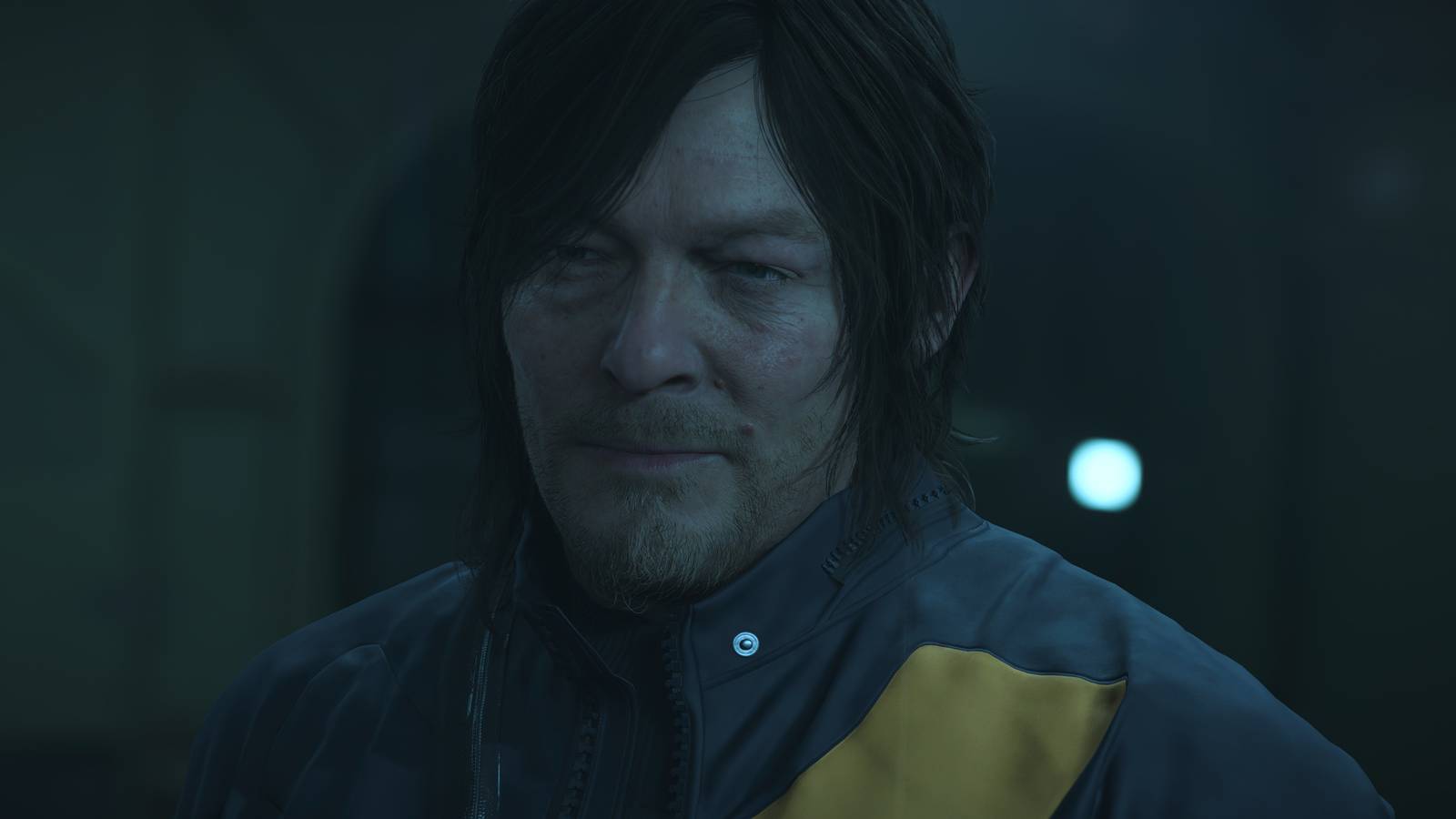 Sam in blue in Death Stranding 2 On the Beach (2025)