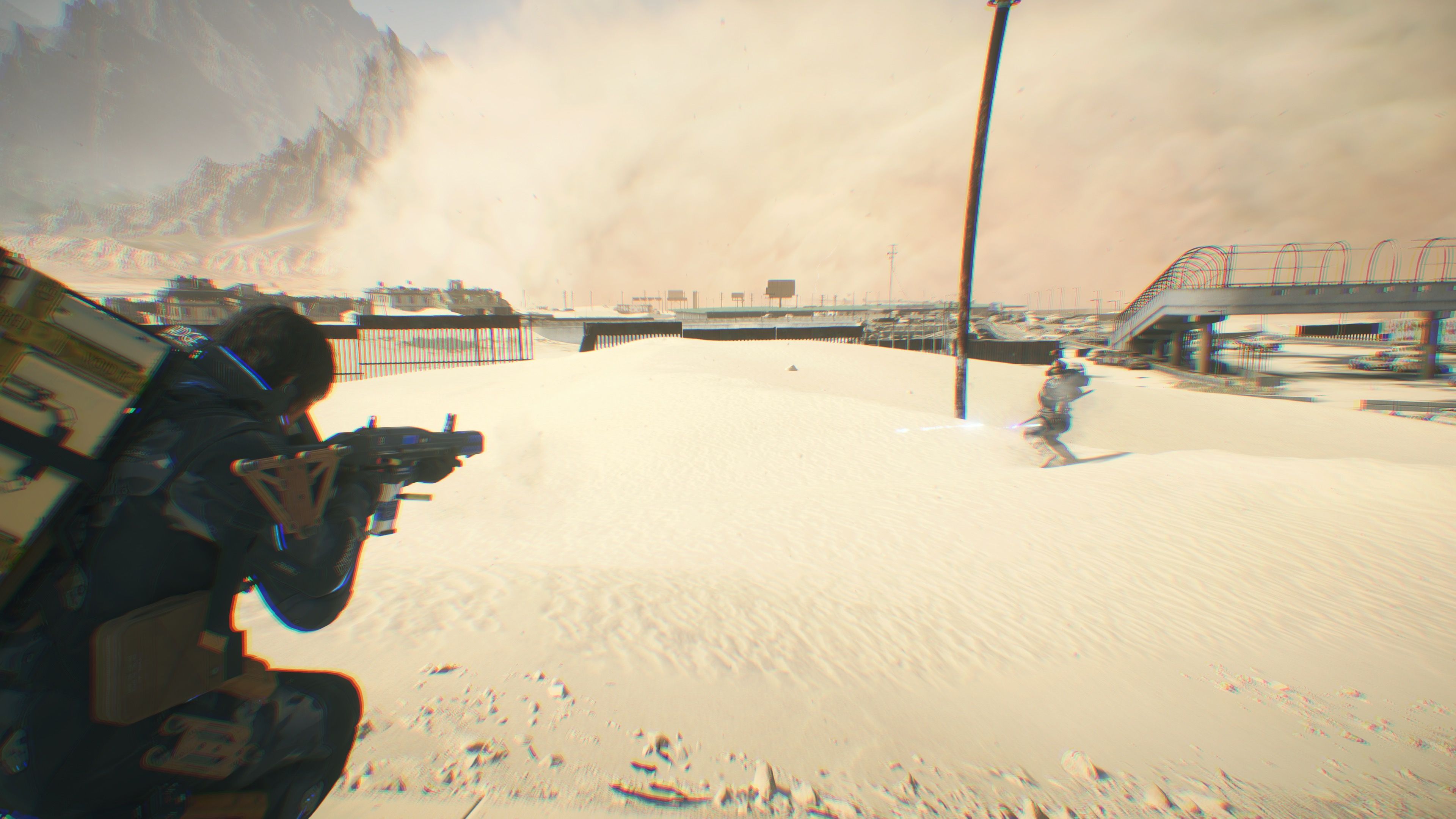 Shooting an enemy in the desert in Death Stranding 2 On the Beach (2025)
