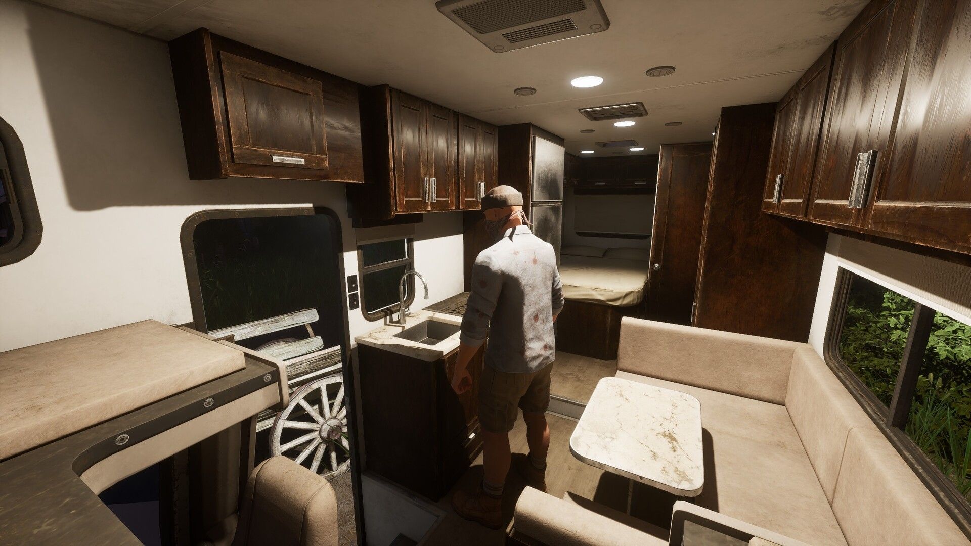 Pemain Ardem di dalam RV, menunjukkan elemen eksplorasi game survival