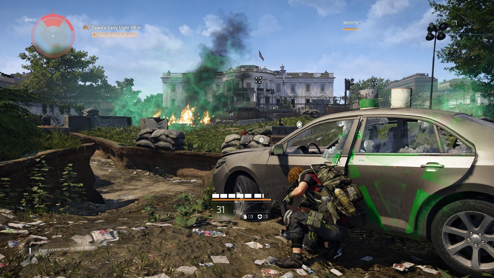 Taking cover behind a car in Tom Clancys The Division 2 (2019)