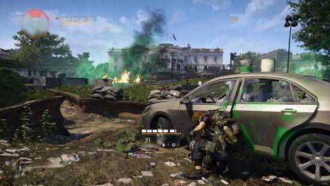 Taking cover behind a car in Tom Clancys The Division 2 (2019)