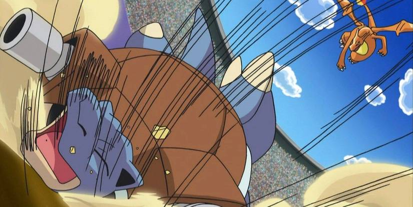 Ash's Charizard uses Seismic Toss against Gary's Blastoise.