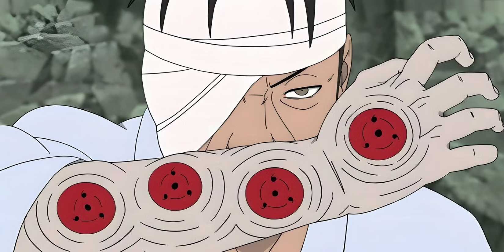 Danzo Shimura grabs his Sharingan arm.
