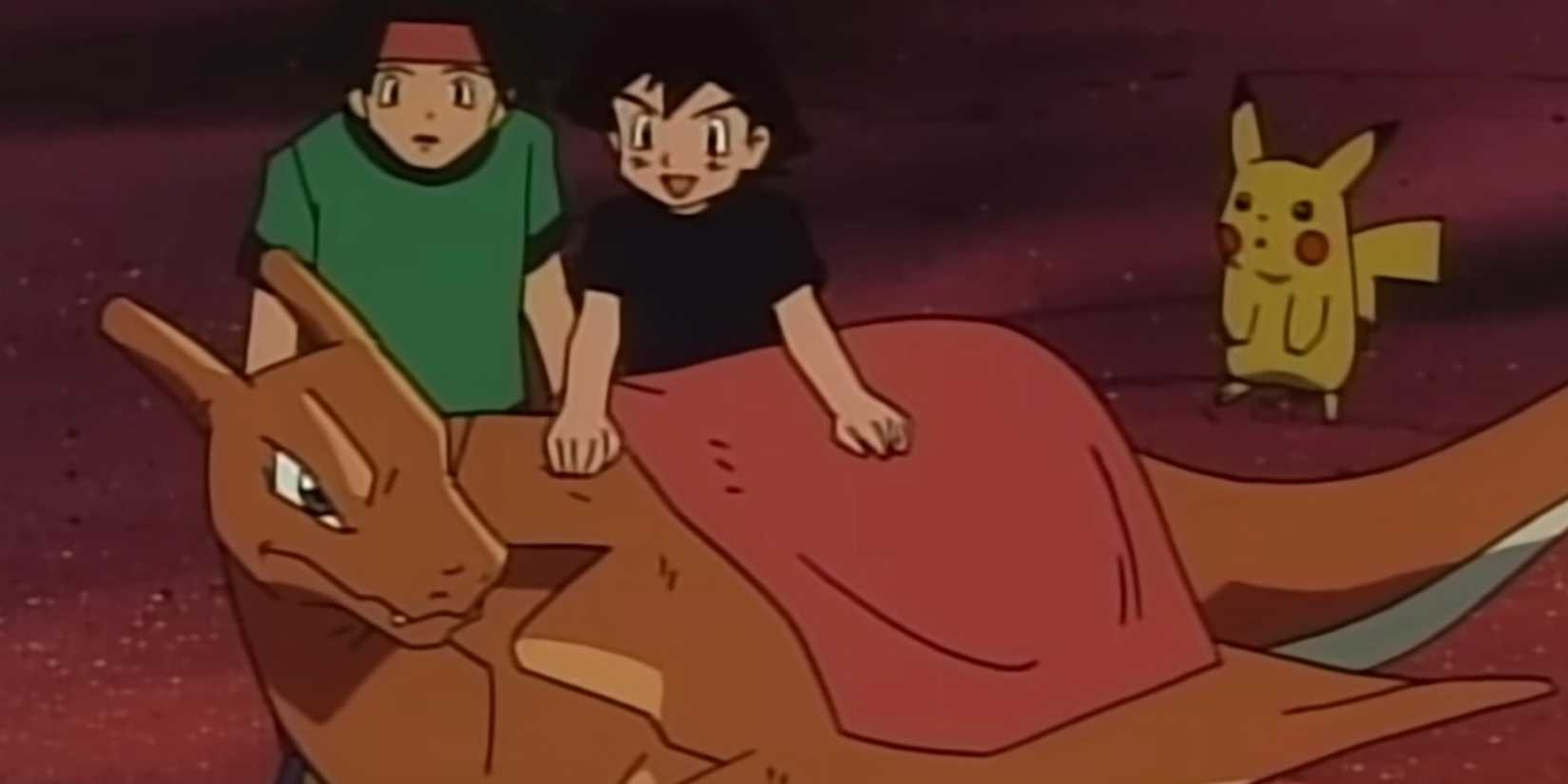 Ash tries to warm up Charizard as Tracey and Pikachu watch.