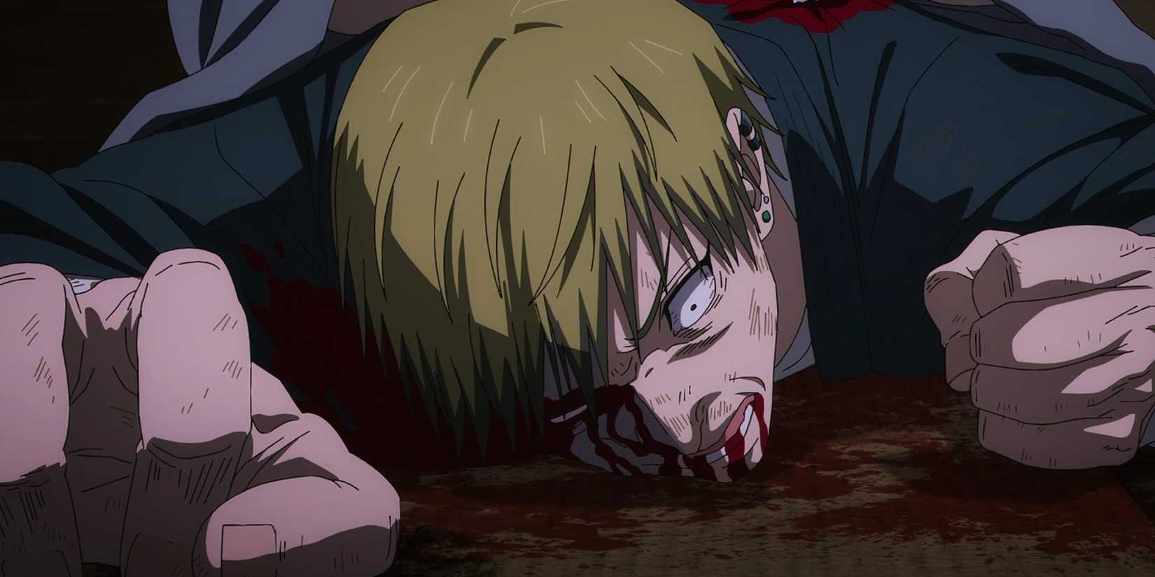 Naoya Zenin lays injured on the floor.