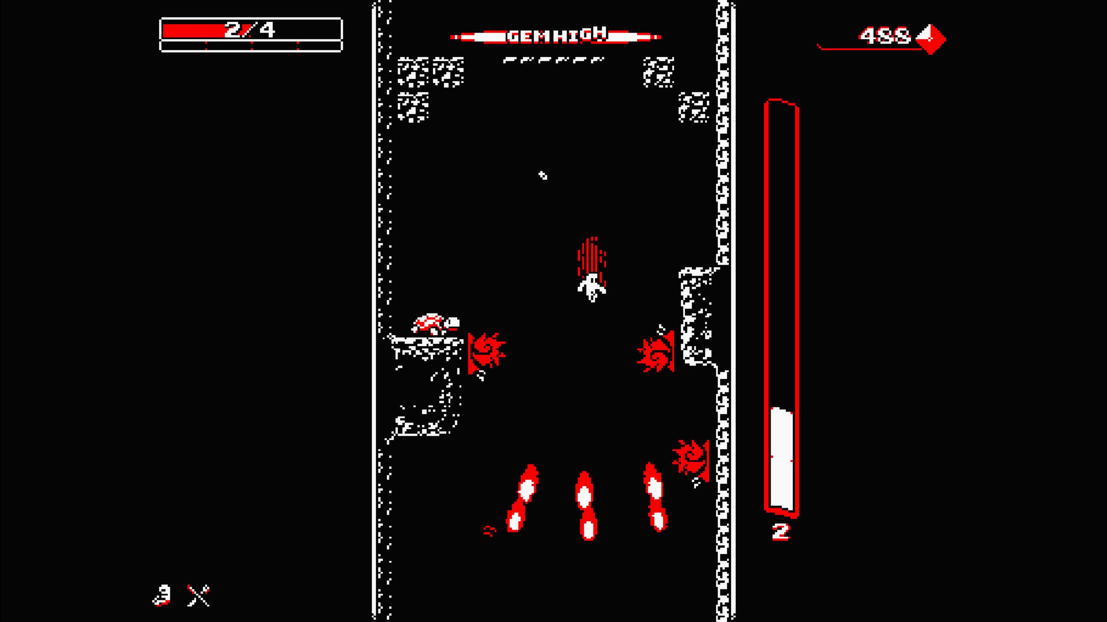 Shooting down at enemies in Downwell (2015)