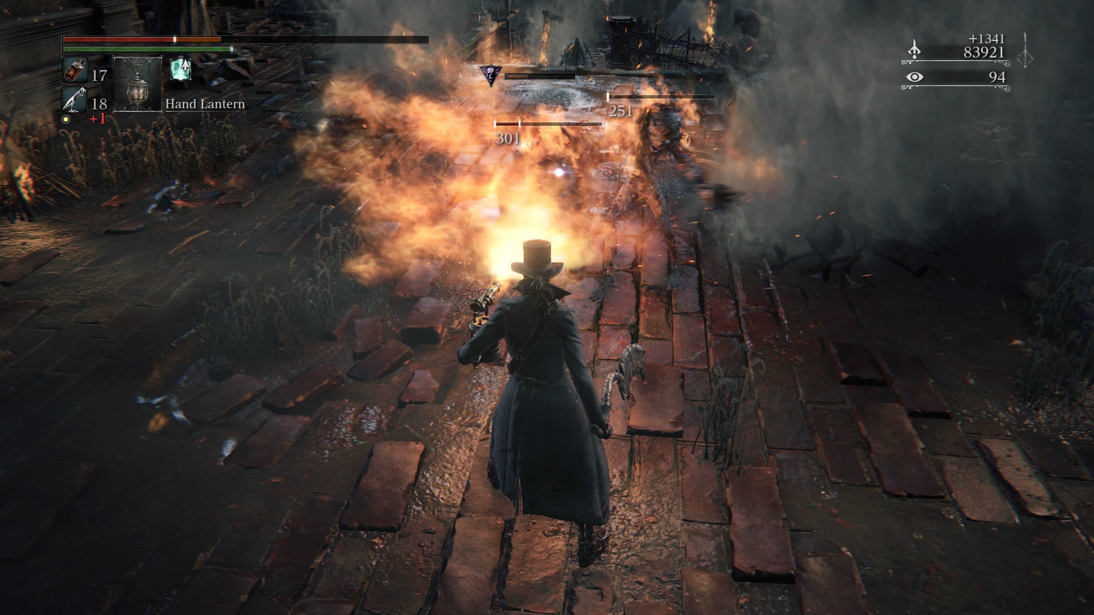 Attacking enemies with fire in Bloodborne (PS4)