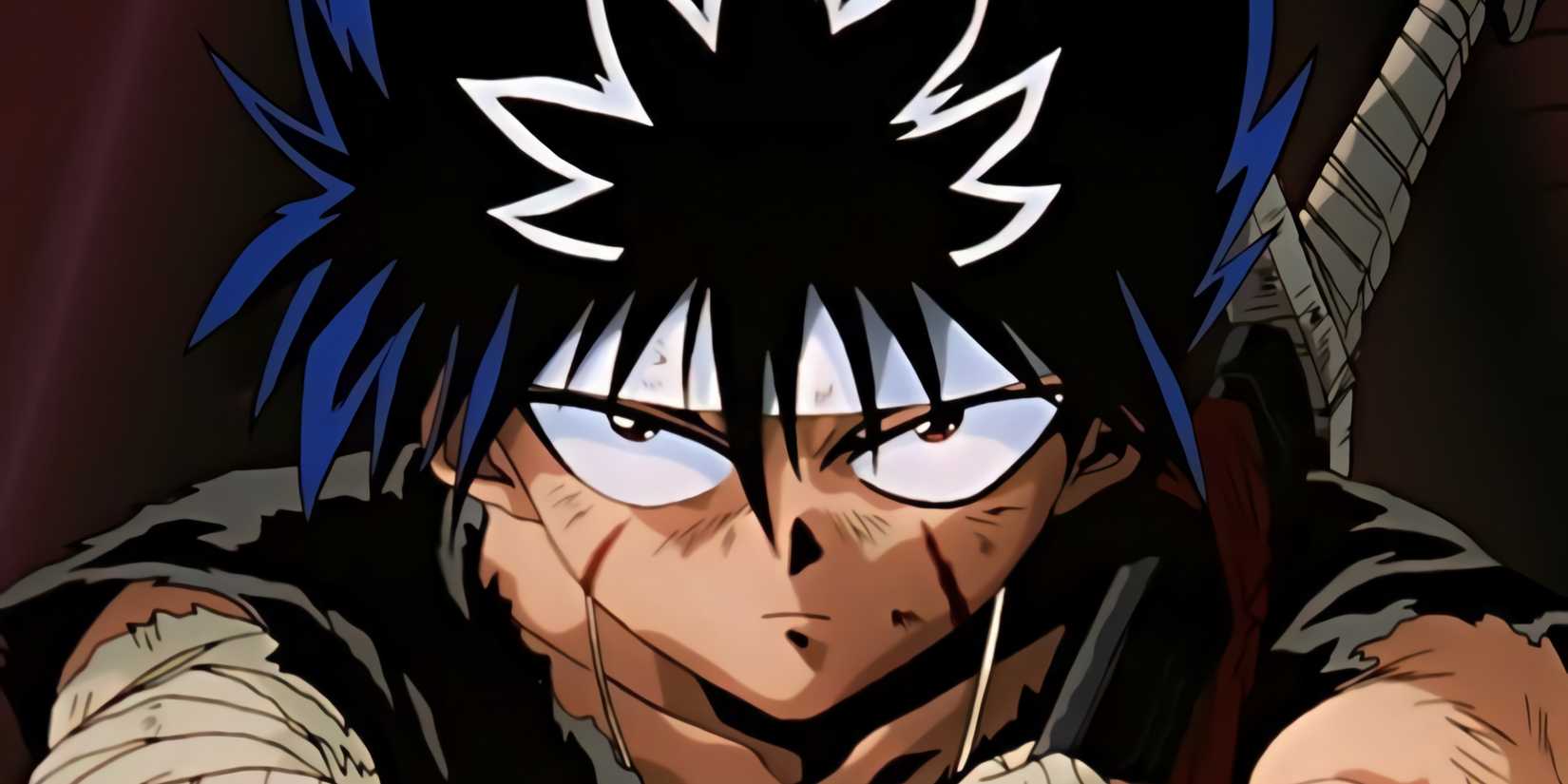 Hiei after the fight, with a sword in his back and many injuries.