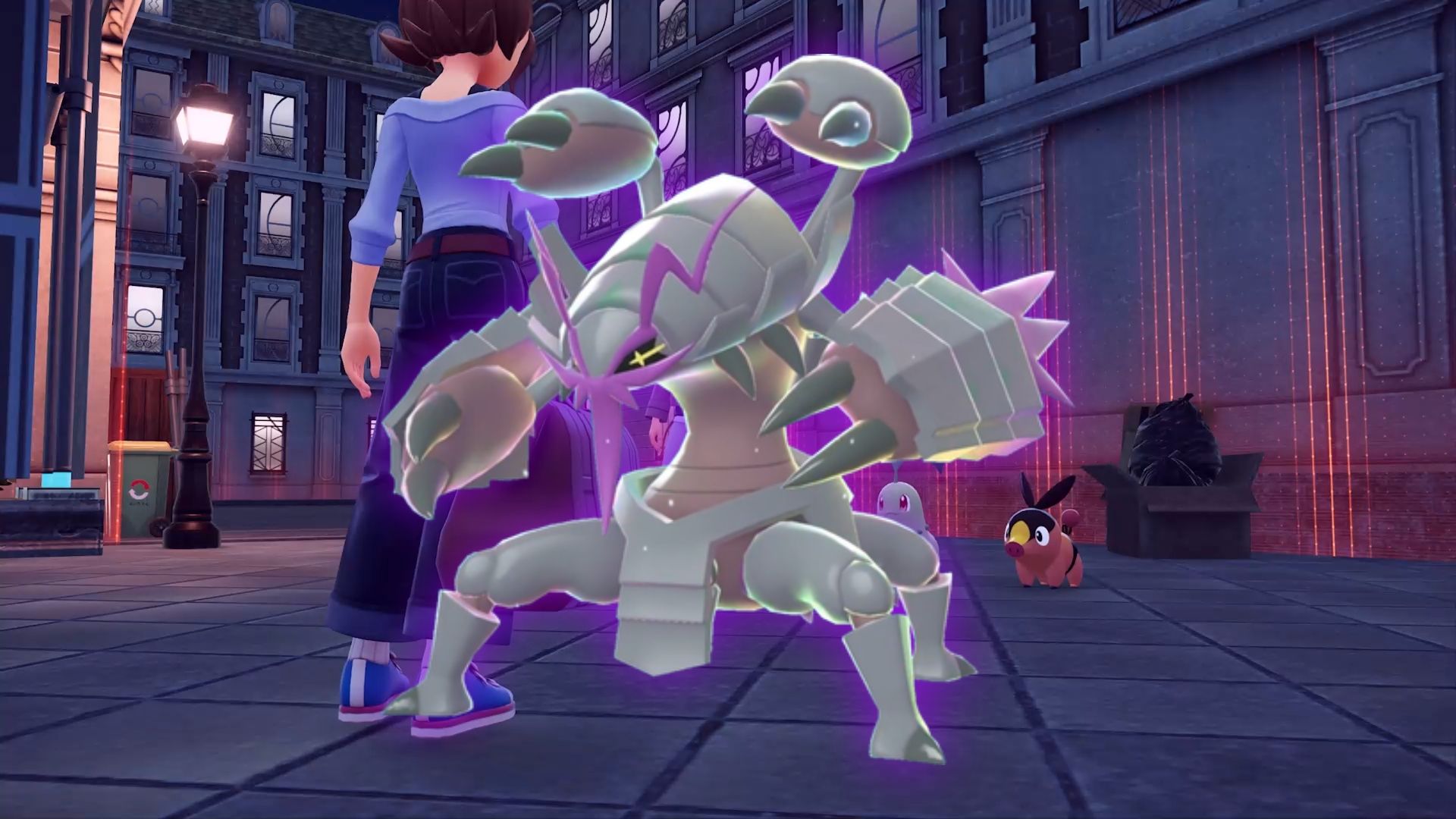 Pokemon Legends: Z-A Mega Dimension DLC's Mega Golisopod is front and center, with an image of the early parts of the game before obtaining your starter in the background