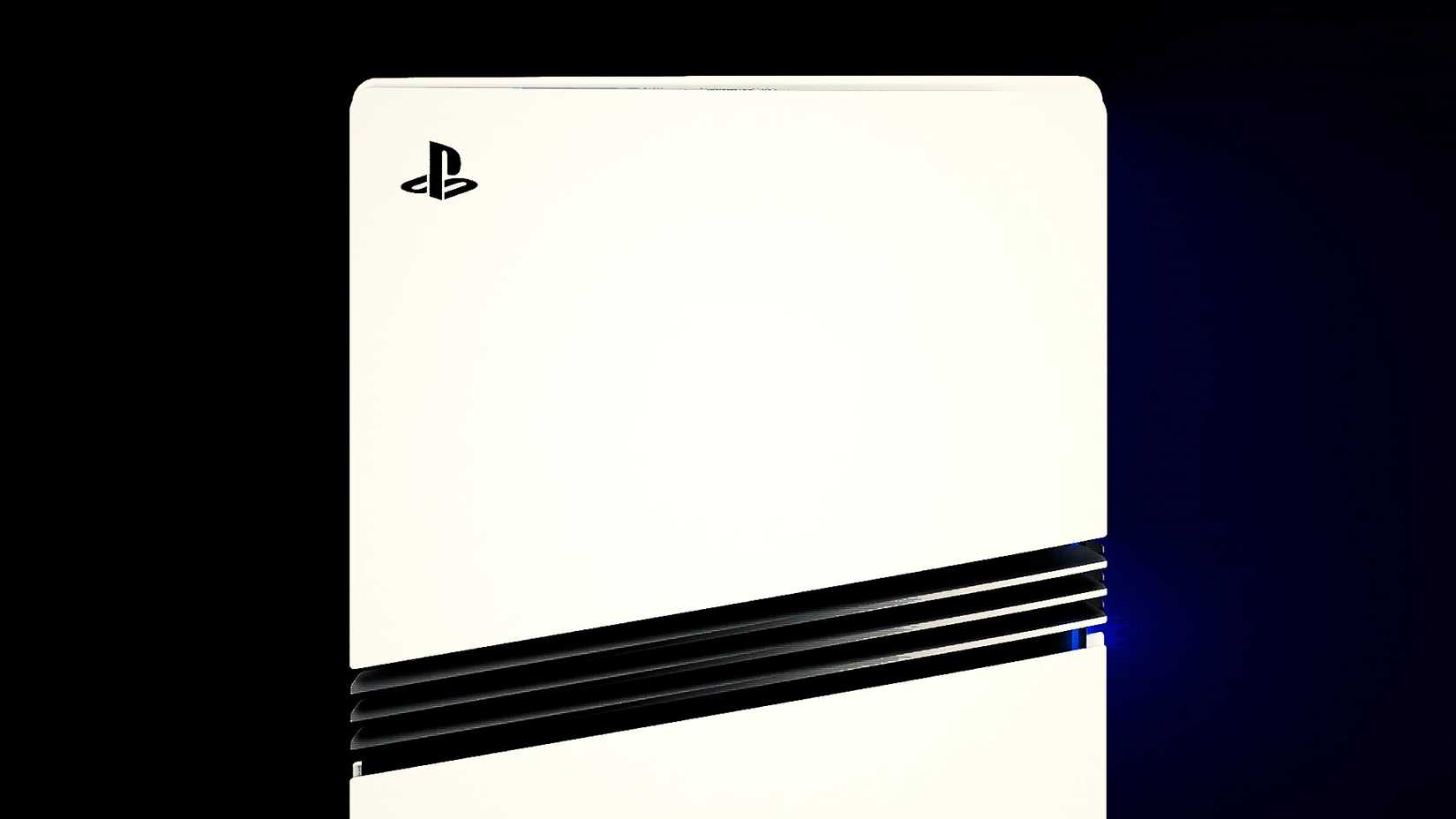 A frontal look of a white PlayStation 5 Pro console, with only its top half visible, on a dark background.
