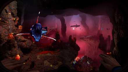 A cave biome with red light and creatures in Subnautica 2