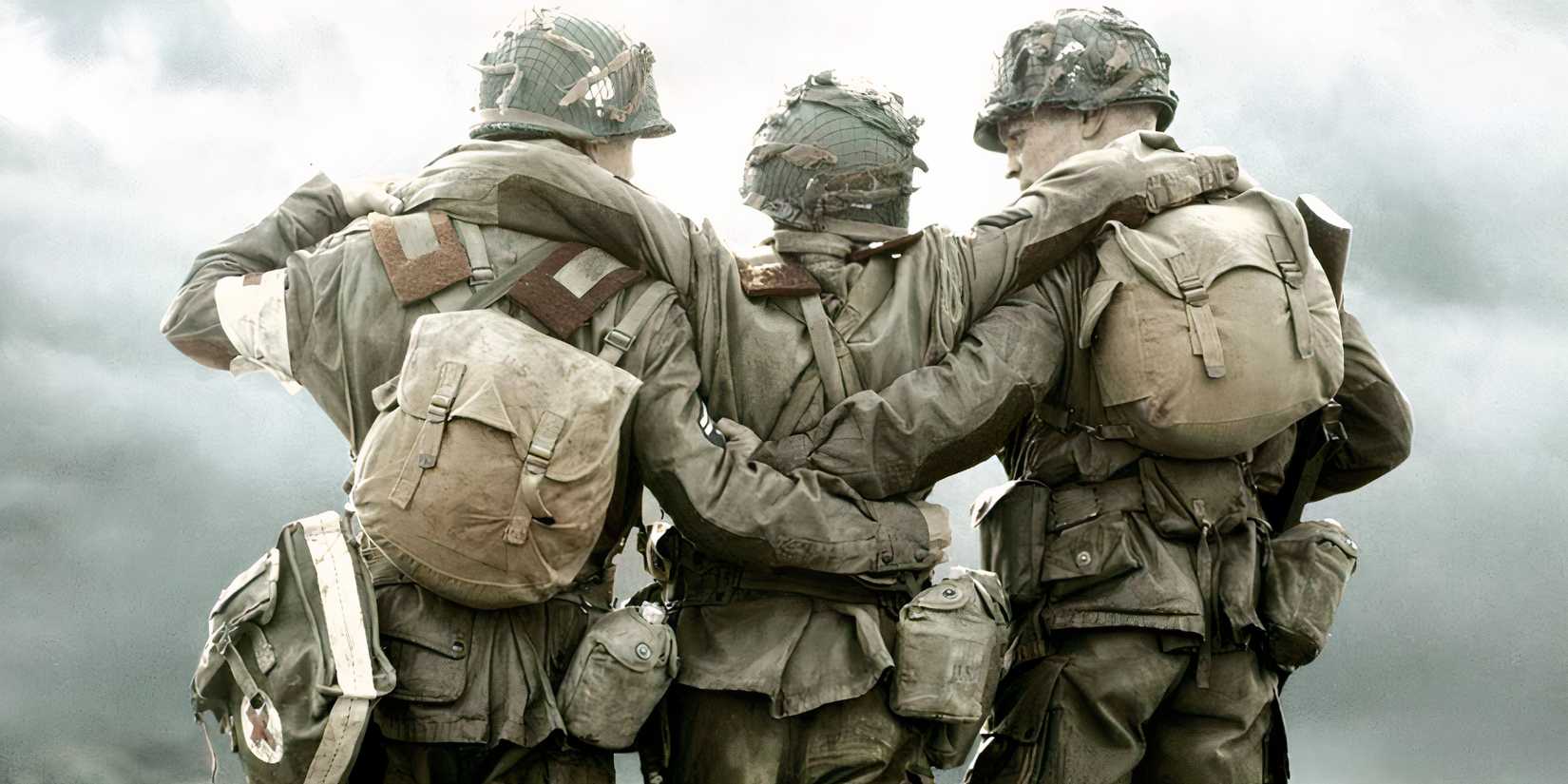 A still image of three soldiers in the Easy Company battalion in Band of Brothers