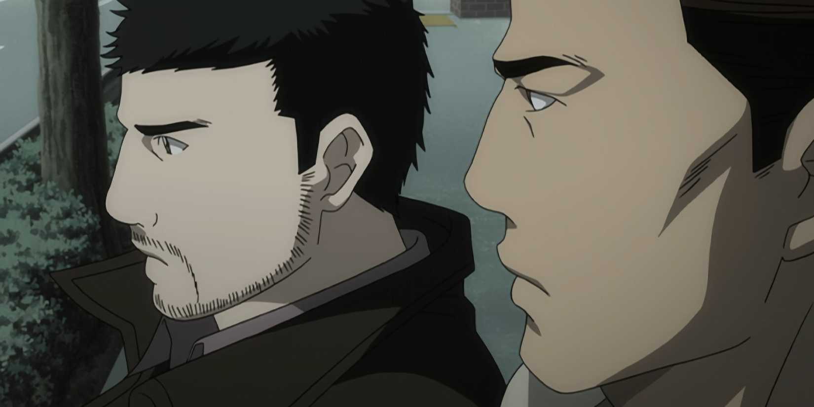 Aizawa and Mogi have serious expressions.