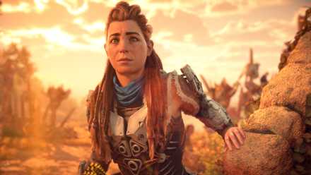 Aloy peaks behind a corner in Horizon Forbidden West