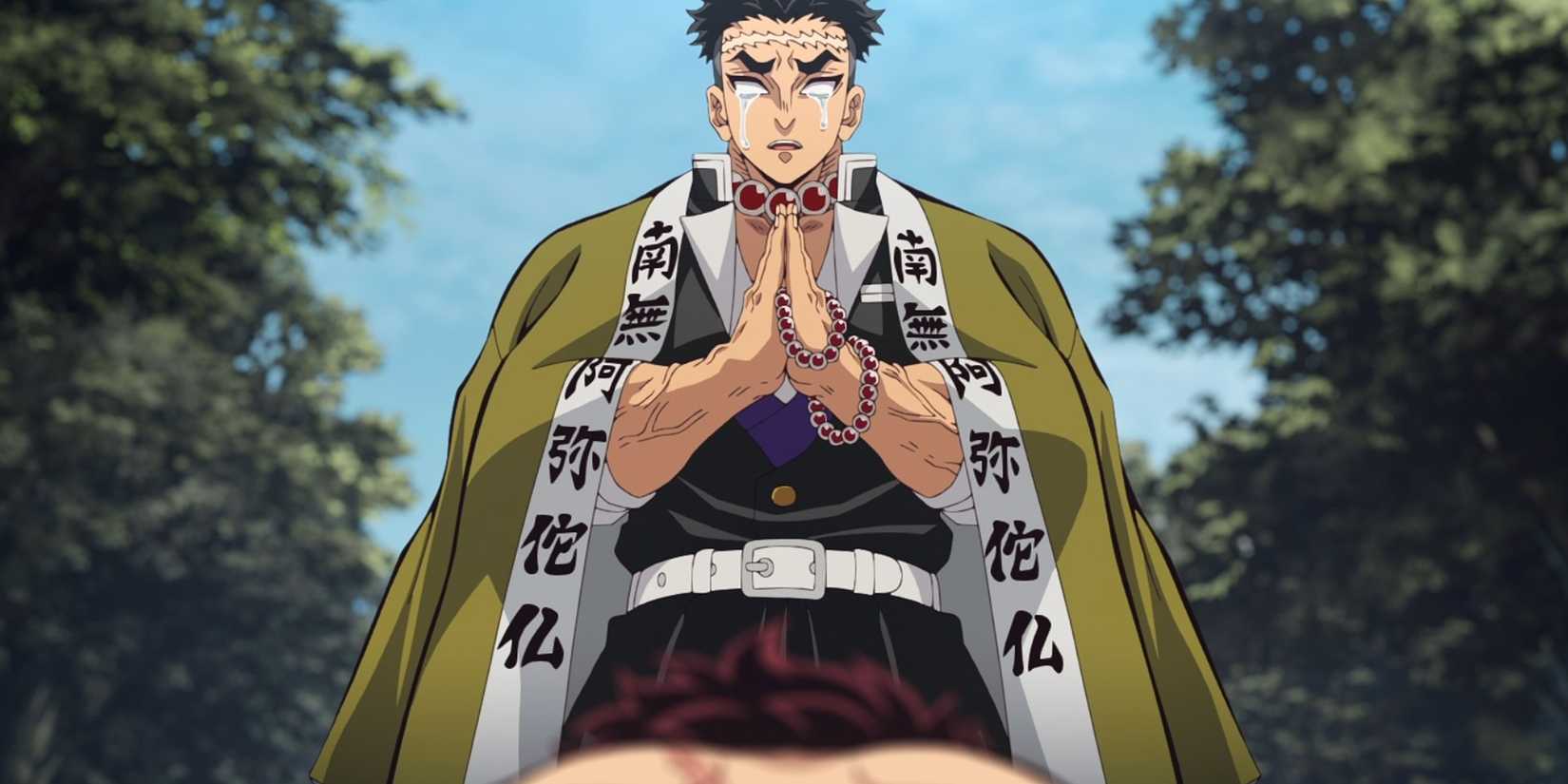 Gyomei Himejima puts his hands together.