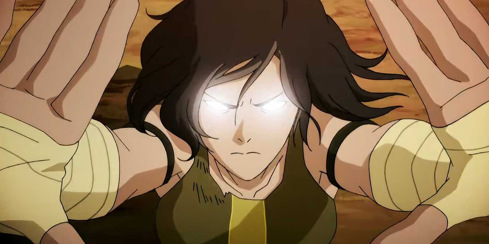 Korra extends her hands in the Avatar State.